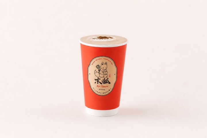 Hot roasted hojicha latte in a Kyo Kitsune paper cup printed with the fox emblem