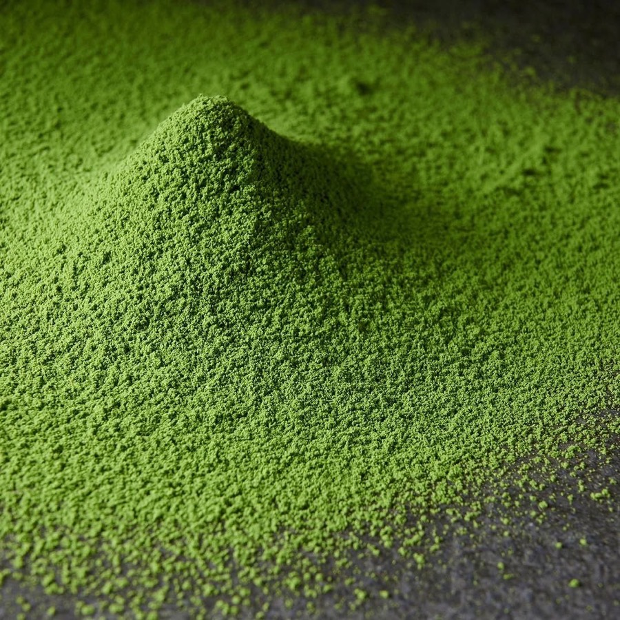 Close-up of vivid green stone-ground matcha powder